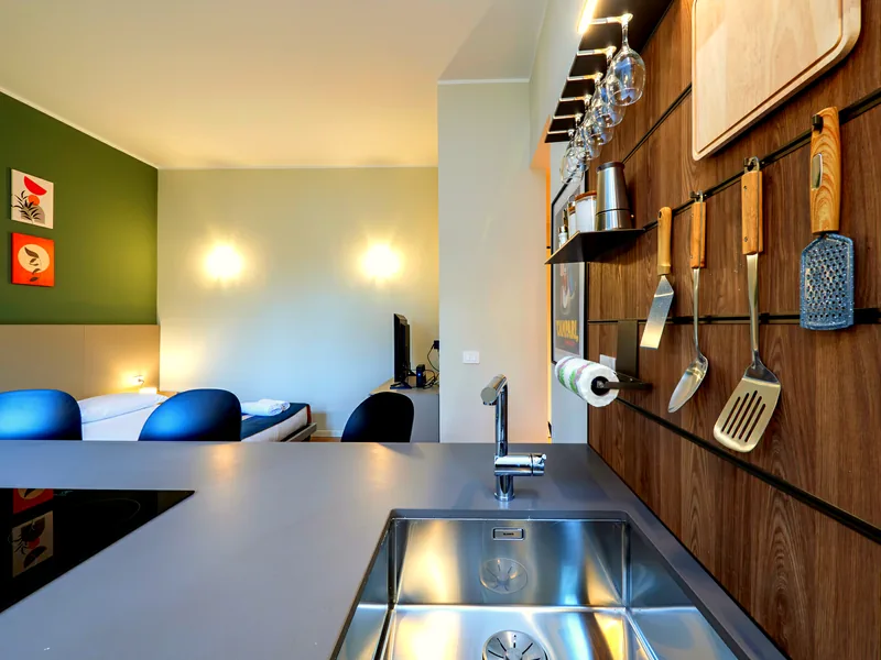 Utensils within easy reach above the sink